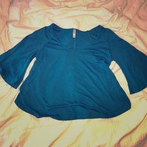 Blue shirt with slit arms